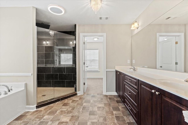 1717 Ethan Way, Hephzibah, GA 30815 - bathroom featuring double vanity, a shower stall, a bath, and stone finish flooring