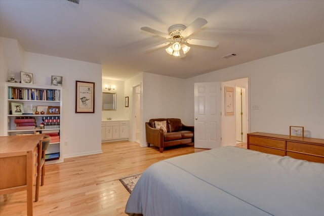 bedroom with ceiling fan, visible vents, ensuite bathroom, baseboards, and light wood-type flooring