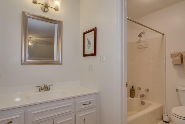 bathroom with toilet, tub / shower combination, and vanity