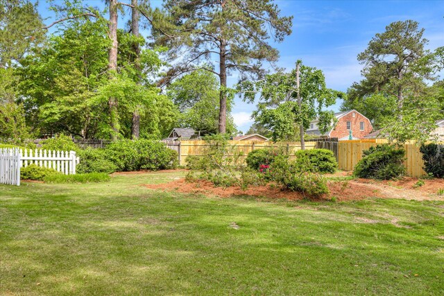 view of yard with fence