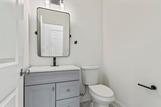 1227 Miller St, Augusta, GA 30901 - half bath with baseboards, toilet, and vanity