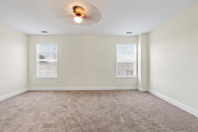 1227 Miller St, Augusta, GA 30901 - unfurnished room featuring light carpet, ceiling fan, and baseboards