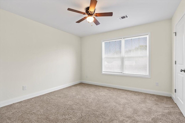 1227 Miller St, Augusta, GA 30901 - carpeted empty room featuring a ceiling fan and baseboards