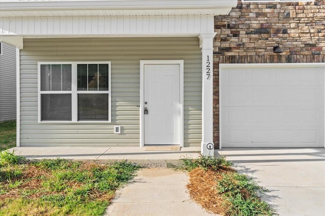 1227 Miller St, Augusta, GA 30901 - doorway to property with an attached garage and driveway
