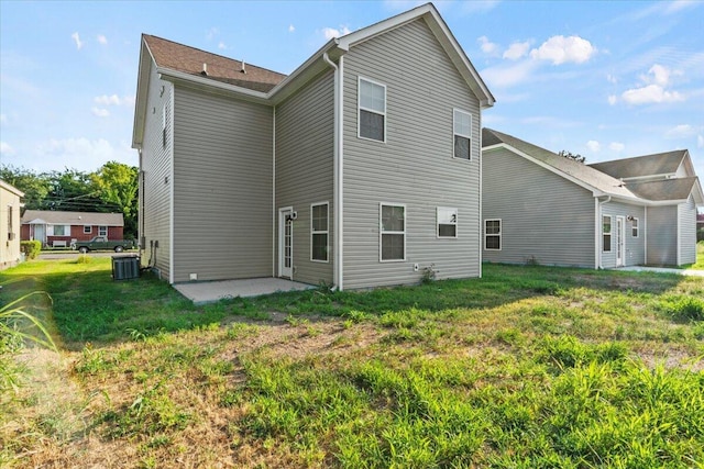 1227 Miller St, Augusta, GA 30901 - rear view of house featuring a patio area, central AC, and a lawn