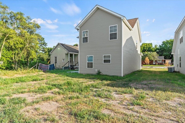 1227 Miller St, Augusta, GA 30901 - rear view of house with central air condition unit and a lawn