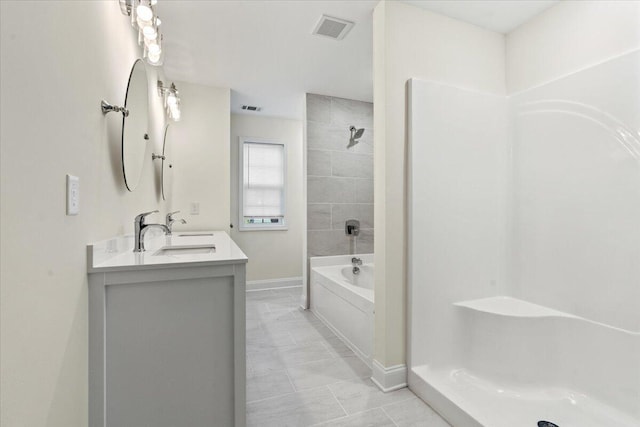 1227 Miller St, Augusta, GA 30901 - full bathroom featuring double vanity, baseboards, and shower / washtub combination