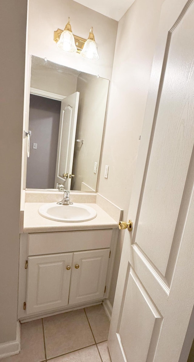 bathroom featuring tile patterned floors and vanity