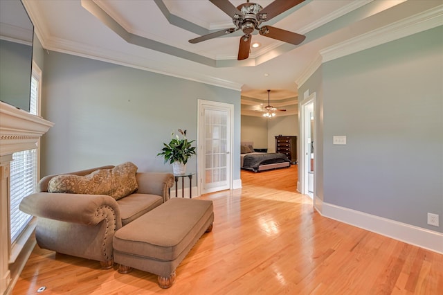 3953 Bolton St, Augusta, GA 30909 - sitting room with a ceiling fan, a raised ceiling, light wood-style floors, and ornamental molding