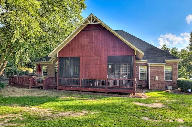 3953 Bolton St, Augusta, GA 30909 - back of property featuring a sunroom, a yard, and brick siding