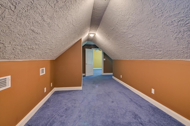 3953 Bolton St, Augusta, GA 30909 - bonus room with a textured ceiling, vaulted ceiling, and carpet