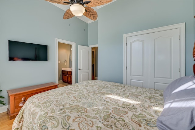 3953 Bolton St, Augusta, GA 30909 - bedroom with high vaulted ceiling, a closet, light wood-style floors, a ceiling fan, and connected bathroom