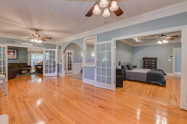 3953 Bolton St, Augusta, GA 30909 - bedroom with french doors, wood finished floors, arched walkways, and crown molding