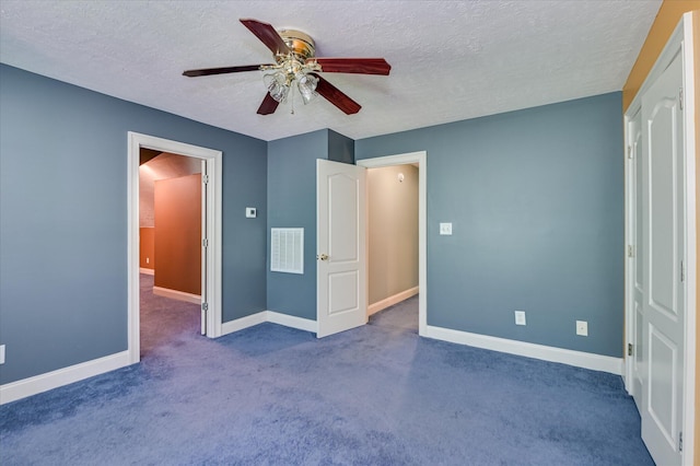 3953 Bolton St, Augusta, GA 30909 - unfurnished bedroom with carpet flooring, a textured ceiling, and ceiling fan