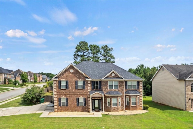 556 Ernestine Fls, Grovetown, GA 30813 - view of front facade with a front lawn, brick siding, and a residential view