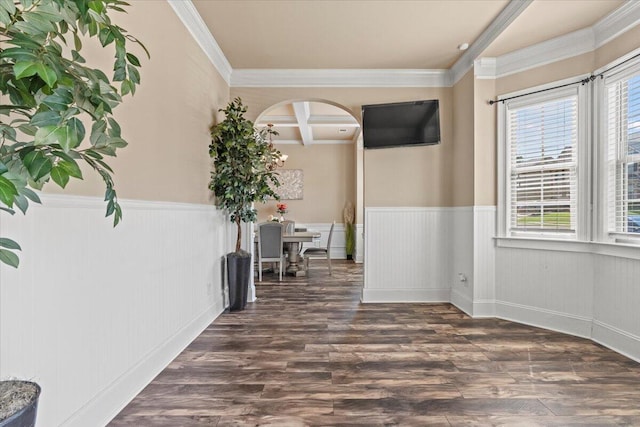 556 Ernestine Fls, Grovetown, GA 30813 - empty room featuring wainscoting, crown molding, arched walkways, wood finished floors, and beam ceiling