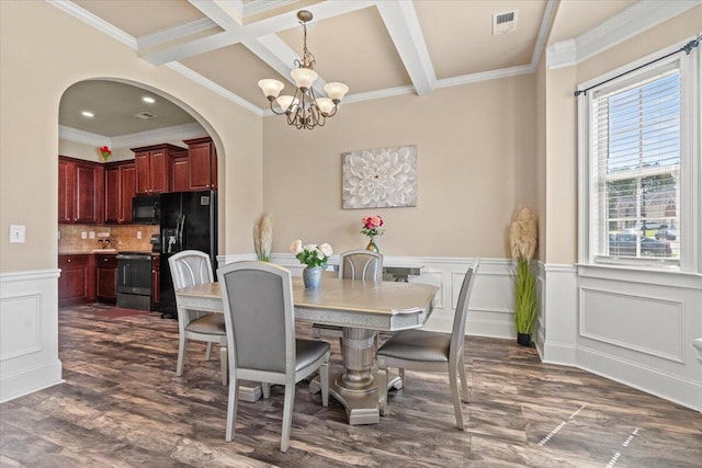 556 Ernestine Fls, Grovetown, GA 30813 - dining space with a chandelier, arched walkways, beam ceiling, dark wood-type flooring, and crown molding