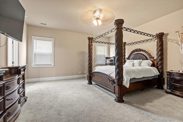 556 Ernestine Fls, Grovetown, GA 30813 - carpeted bedroom with multiple windows and a ceiling fan