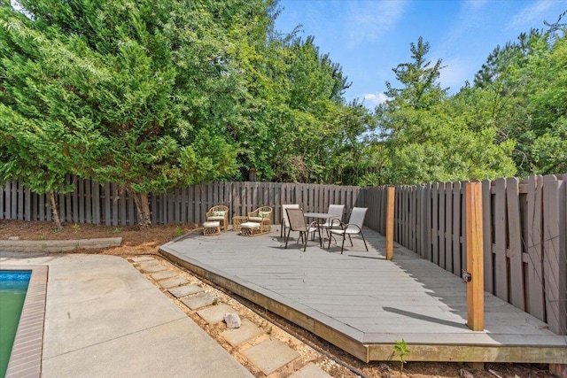 556 Ernestine Fls, Grovetown, GA 30813 - deck featuring a fenced backyard and outdoor dining area
