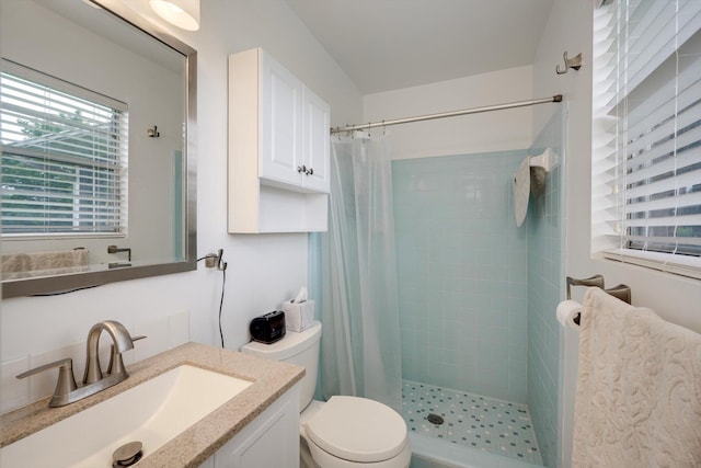 3593 Westhampton Dr, Martinez, GA 30907 - bathroom featuring vanity, tiled shower, and toilet