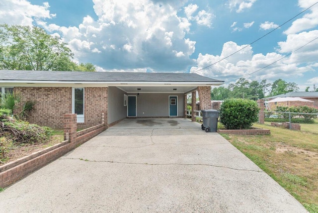 4015 Goshen Lake S, Augusta, GA 30906 - view of front of property with an attached carport, concrete driveway, and brick siding