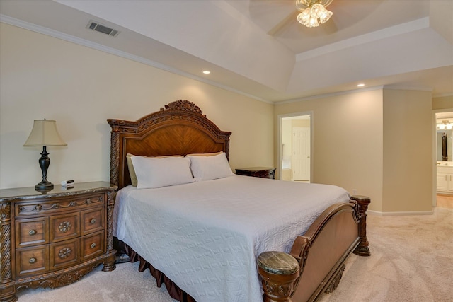 bedroom featuring visible vents, carpet floors, recessed lighting, connected bathroom, and a tray ceiling