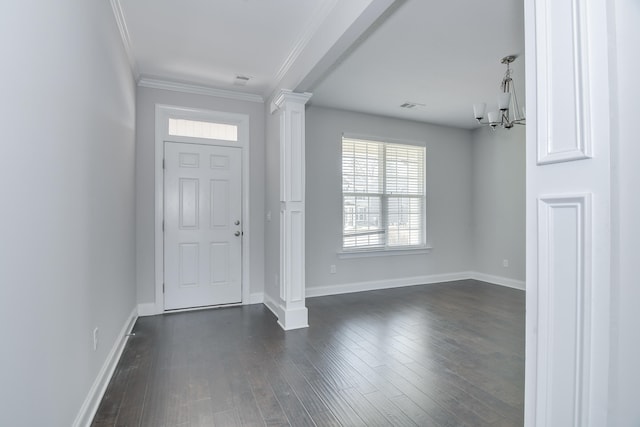 141 Caroleton Dr, Grovetown, GA 30813 - foyer entrance with a chandelier, plenty of natural light, ornamental molding, dark wood-style floors, and ornate columns