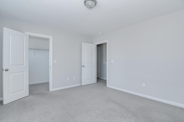 141 Caroleton Dr, Grovetown, GA 30813 - unfurnished bedroom featuring carpet flooring, a spacious closet, and a closet