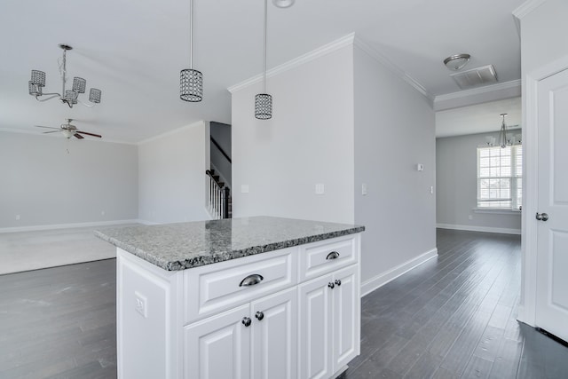141 Caroleton Dr, Grovetown, GA 30813 - kitchen with a chandelier, ceiling fan, dark wood finished floors, ornamental molding, and white cabinetry
