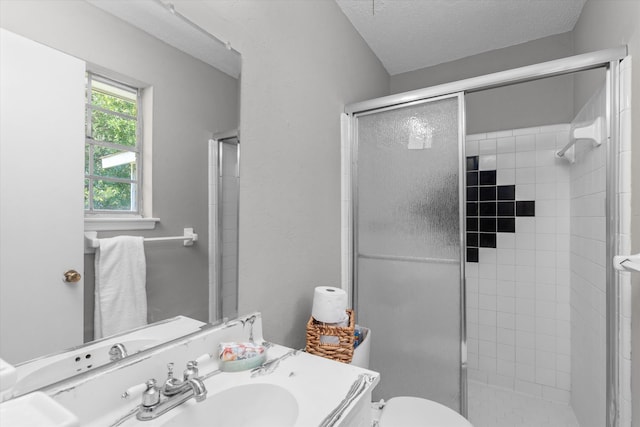 2701 Gardenbrook Ct, Augusta, GA 30906 - full bath with vanity, a shower stall, toilet, and a textured ceiling