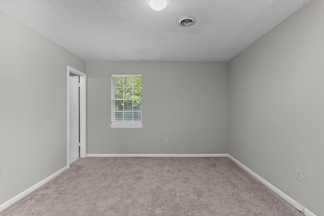 2701 Gardenbrook Ct, Augusta, GA 30906 - empty room with a textured ceiling, carpet floors, and baseboards