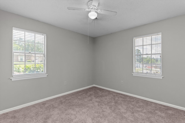 2701 Gardenbrook Ct, Augusta, GA 30906 - unfurnished room featuring healthy amount of natural light, carpet flooring, baseboards, ceiling fan, and a textured ceiling
