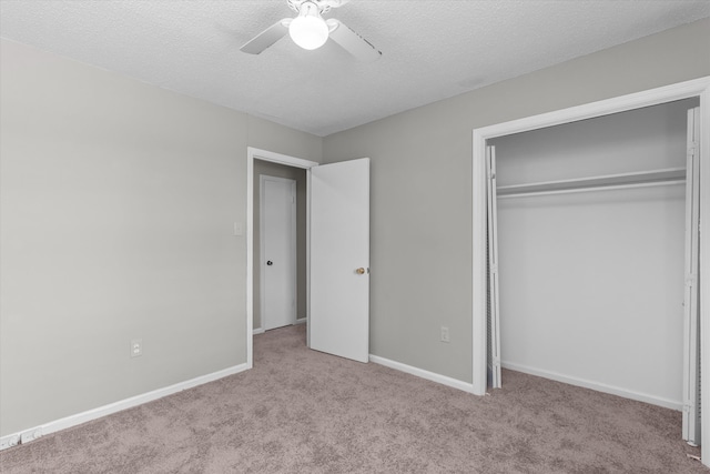 2701 Gardenbrook Ct, Augusta, GA 30906 - unfurnished bedroom with carpet flooring, a closet, a textured ceiling, baseboards, and a ceiling fan