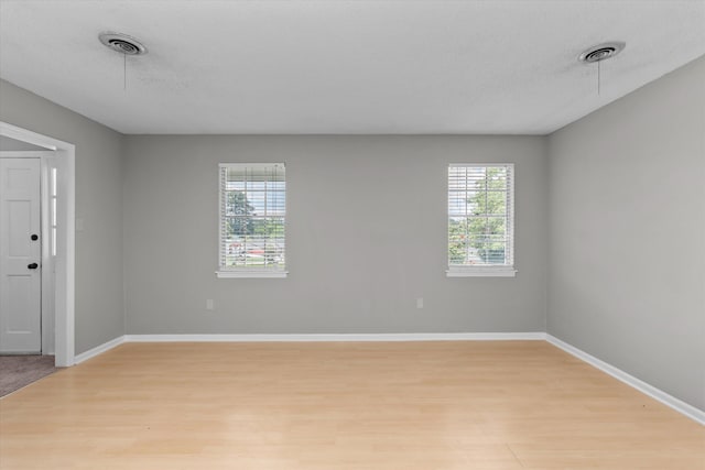 2701 Gardenbrook Ct, Augusta, GA 30906 - spare room with light wood-style flooring, baseboards, and a textured ceiling