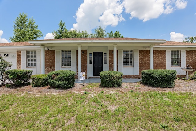 2701 Gardenbrook Ct, Augusta, GA 30906 - ranch-style home with brick siding, a front lawn, and covered porch