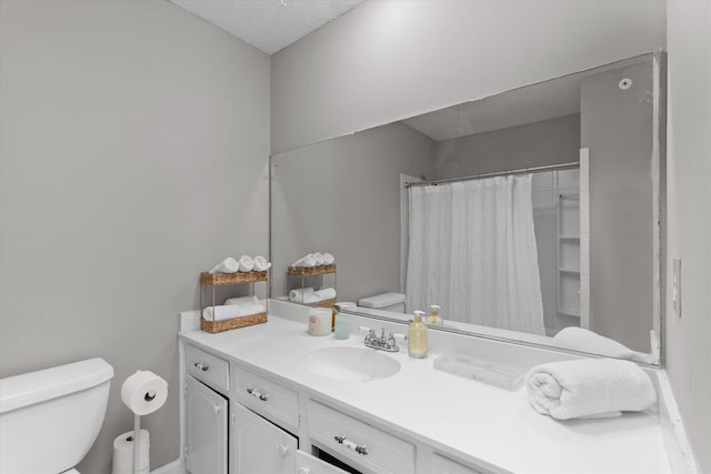 2701 Gardenbrook Ct, Augusta, GA 30906 - full bath with toilet, vanity, a shower with curtain, and a textured ceiling