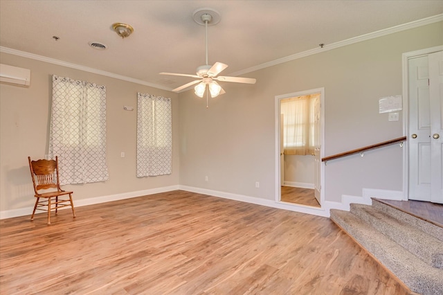 280 W Forrest St, Harlem, GA 30814 - unfurnished room featuring light wood-type flooring, baseboards, ceiling fan, crown molding, and a wall mounted air conditioner