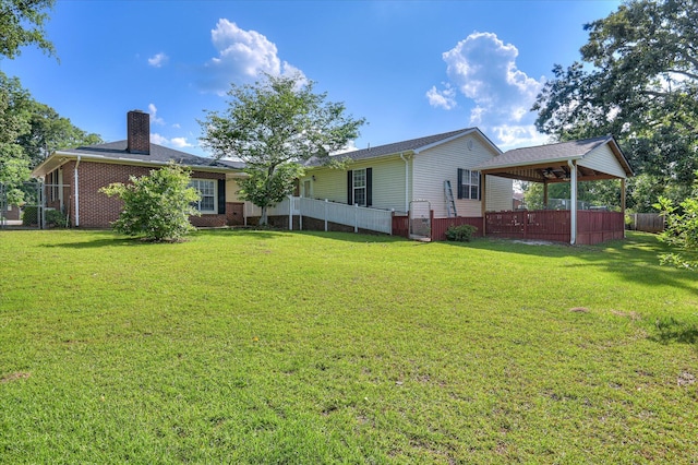 280 W Forrest St, Harlem, GA 30814 - back of property featuring a chimney, brick siding, and ceiling fan