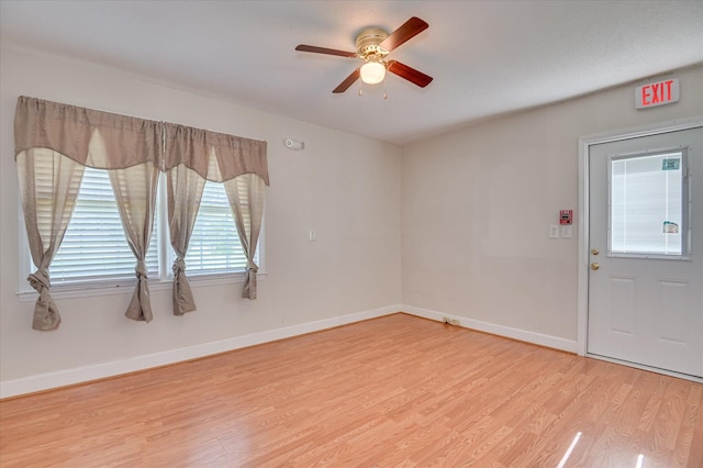 280 W Forrest St, Harlem, GA 30814 - empty room featuring light wood-type flooring, a ceiling fan, and baseboards