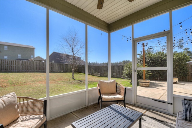 sunroom / solarium with ceiling fan