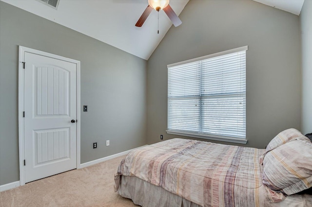 carpeted bedroom with baseboards, lofted ceiling, and ceiling fan