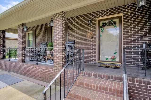 707 Oriole St, Aiken, SC 29803 - property entrance with a porch and brick siding