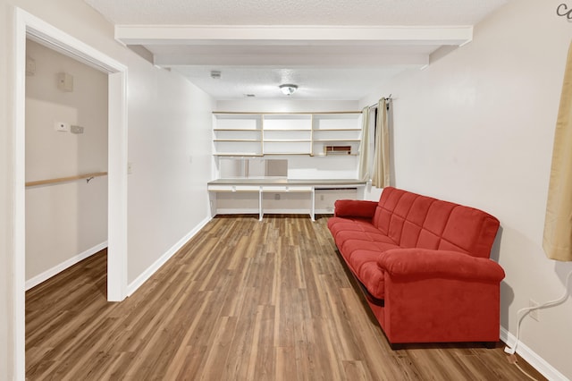 3613 Concord Ct, Augusta, GA 30906 - living area featuring beam ceiling, a textured ceiling, and wood finished floors
