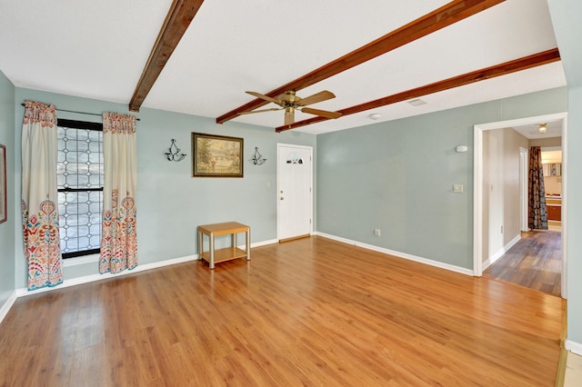 3613 Concord Ct, Augusta, GA 30906 - unfurnished living room featuring ceiling fan, wood finished floors, and beamed ceiling