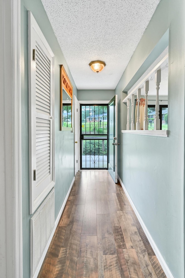 3613 Concord Ct, Augusta, GA 30906 - hall featuring a textured ceiling and wood finished floors