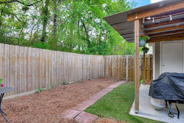 view of yard featuring a fenced backyard
