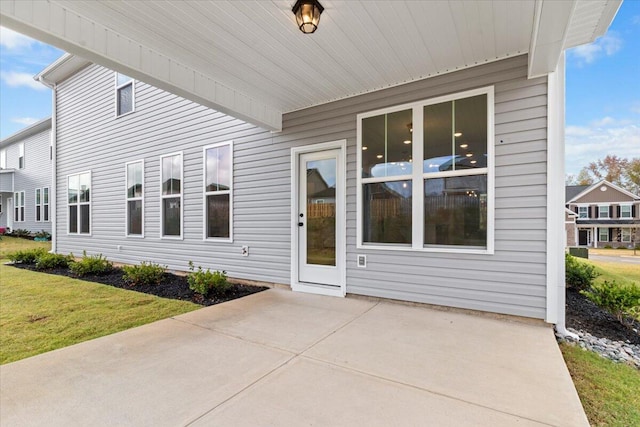 exterior space featuring a yard and a patio