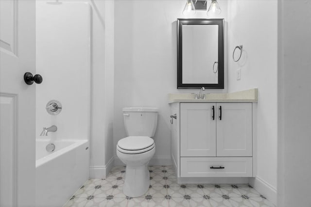 full bathroom featuring toilet, tile patterned floors, baseboards, and vanity