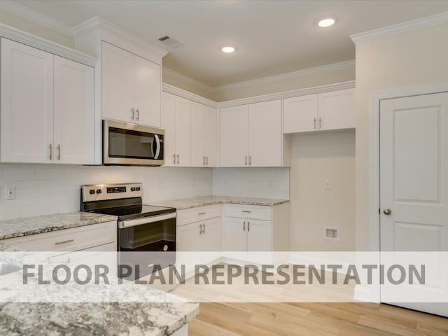 kitchen with white cabinetry, light stone countertops, crown molding, and stainless steel appliances