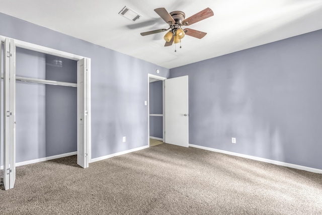1736 Goshen Rd, Augusta, GA 30906 - unfurnished bedroom featuring carpet floors, a closet, and a ceiling fan